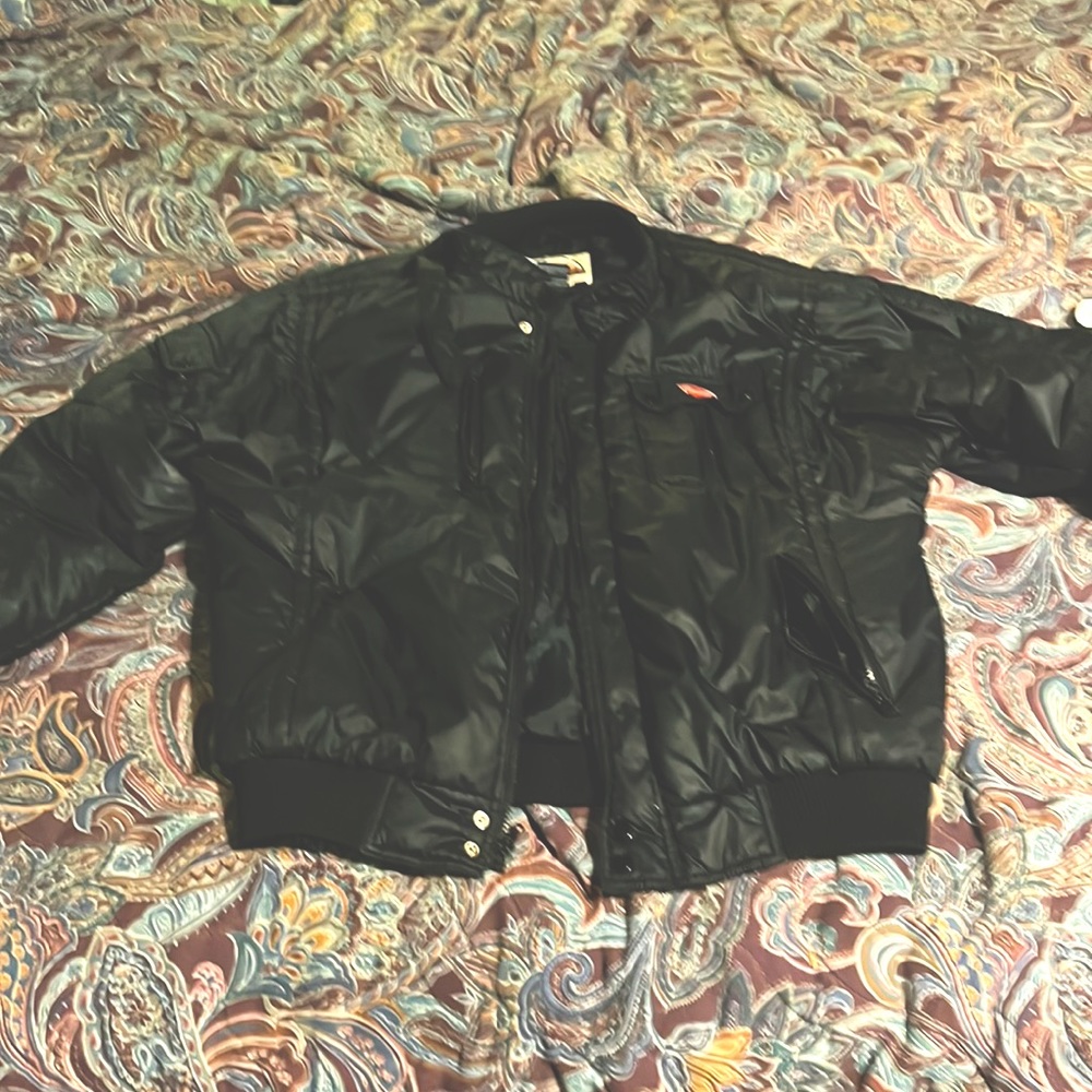 Black bomber jacket very warm. Excellent condition.